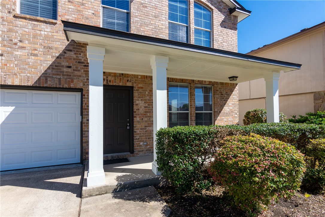 2605 Summerwalk Place Round Rock, TX 78665 - Photo 7 of 37 a front view of a house with a yard