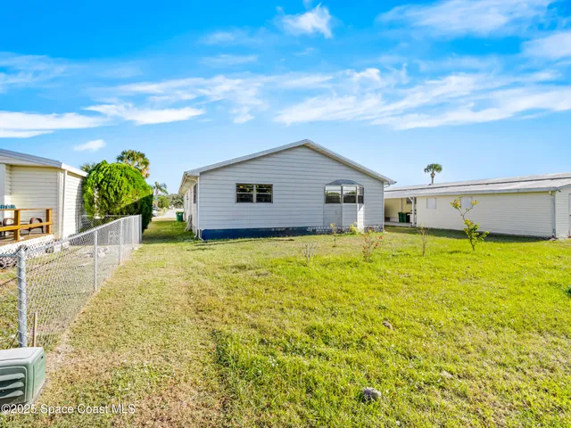 a house view with a swimming pool