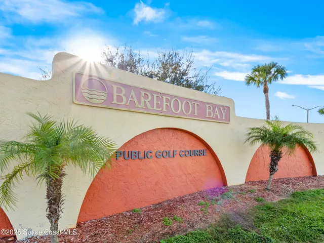 a sign that is on the wall of building