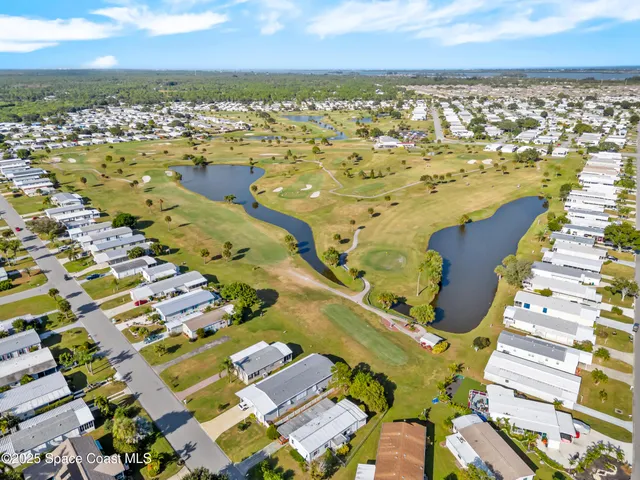 a view of a city with an ocean view