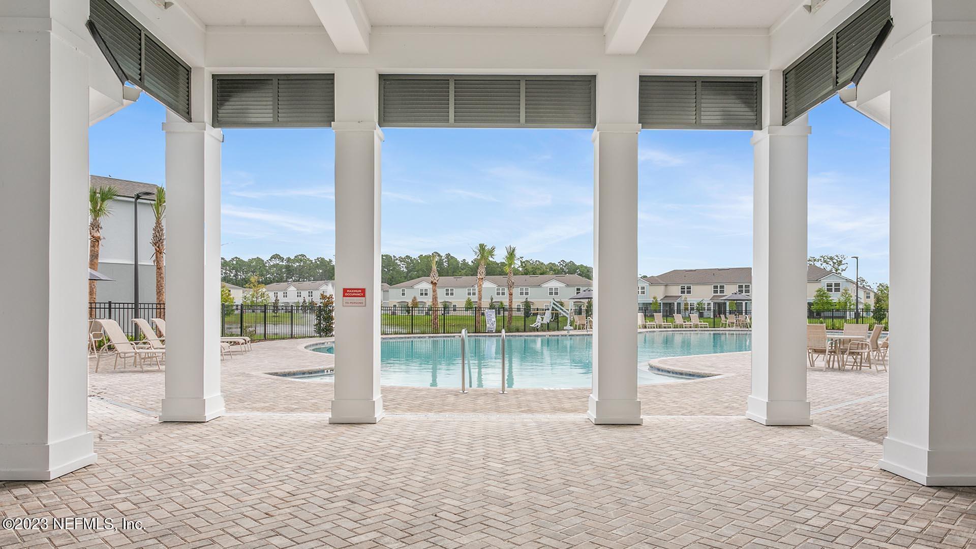 30 Tidal Beach Ave Street St. Augustine, FL 32095 - Photo 19 of 47 a view of a room with balcony and ocean view