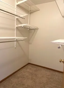 a view of a room with racks on the wall