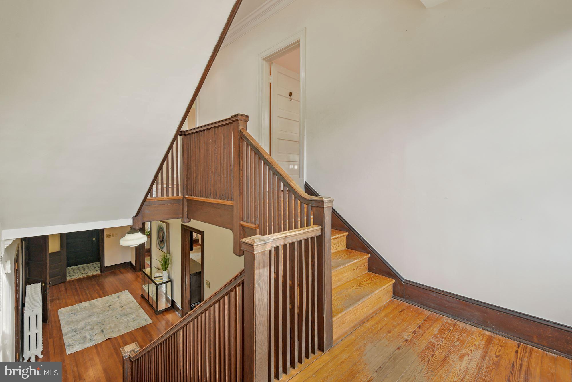 6812 Connecticut Avenue Chevy Chase, MD 20815 - Photo 12 of 37 Gracious landing btwn 1st & 2nd floor, back stair