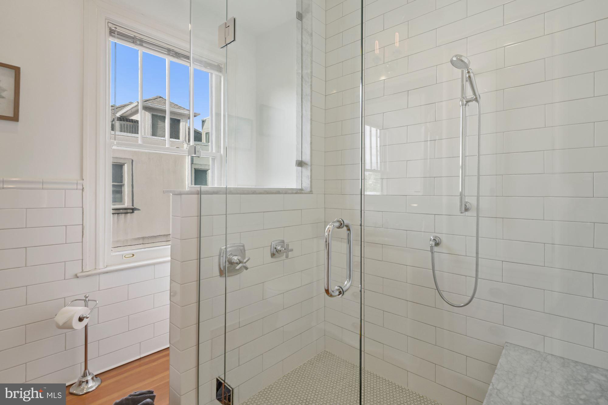 6812 Connecticut Avenue Chevy Chase, MD 20815 - Photo 16 of 37 Lux bath in 2nd level en-suite BR/BA