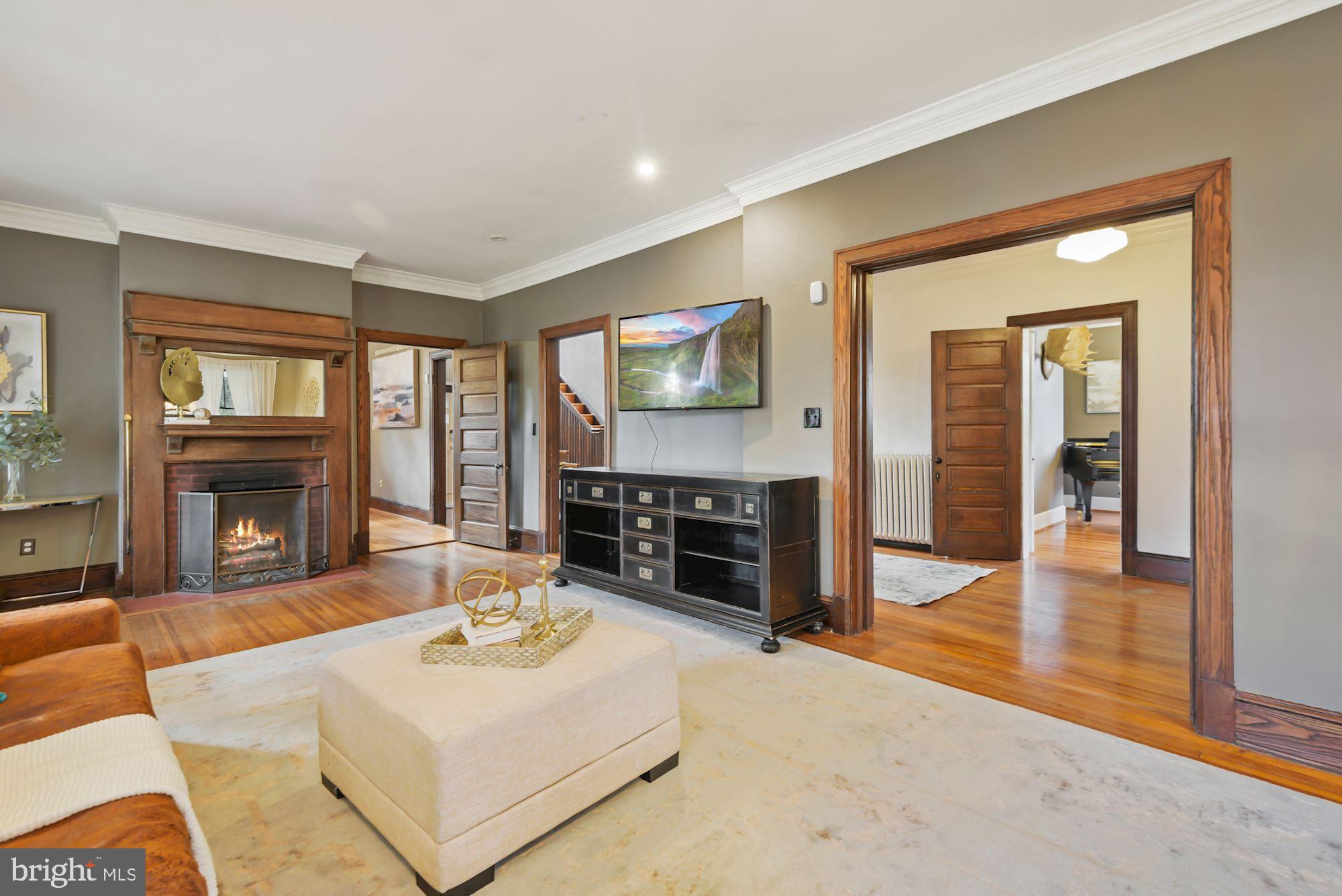 6812 Connecticut Avenue Chevy Chase, MD 20815 - Photo 4 of 37 Huge formal living room with fireplace