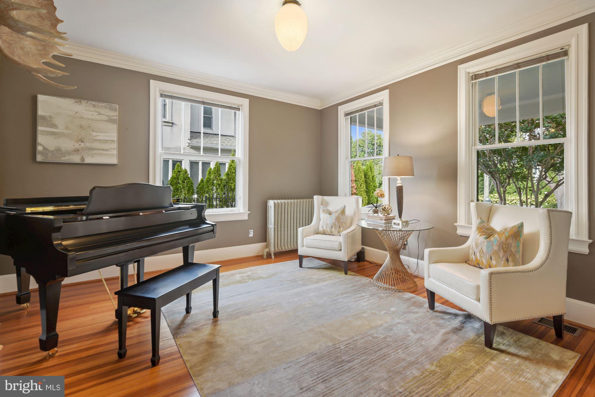 6812 Connecticut Avenue Chevy Chase, MD 20815 - Photo 6 of 37 Bright front room also has beautiful pine floors