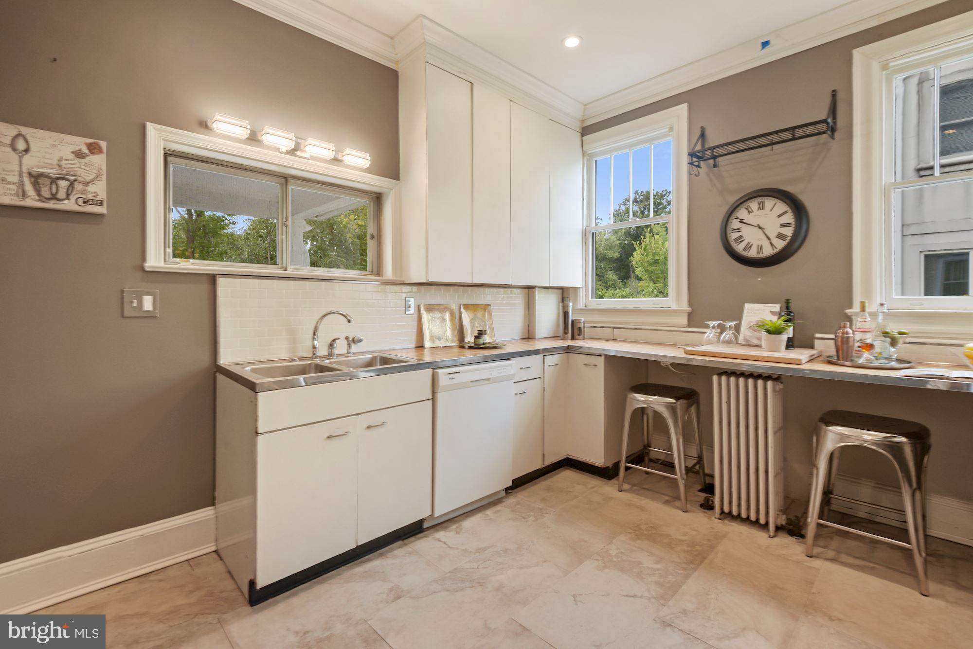 6812 Connecticut Avenue Chevy Chase, MD 20815 - Photo 9 of 37 Kitchen is bright and can be easily expanded