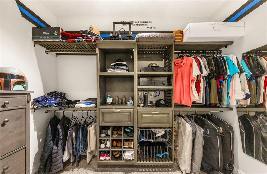 6916 Neopolitan Court Apollo Beach, FL 33572 - Photo 22 of 43 a view of a closet with storage