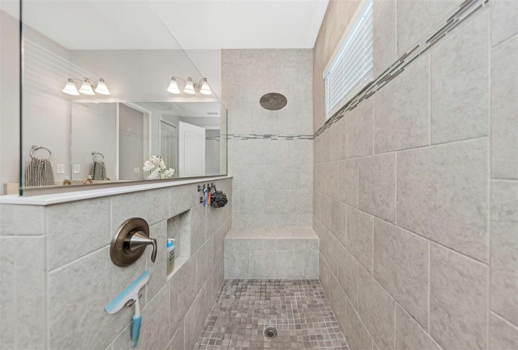 6916 Neopolitan Court Apollo Beach, FL 33572 - Photo 26 of 43 a bathroom with a sink and mirror