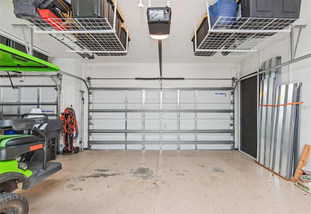 6916 Neopolitan Court Apollo Beach, FL 33572 - Photo 42 of 43 a view of a garage with storage