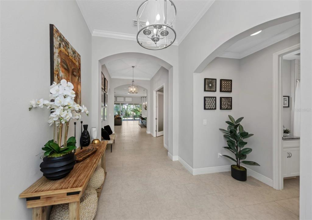 6916 Neopolitan Court Apollo Beach, FL 33572 - Photo 7 of 43 a view of an entryway with dining area