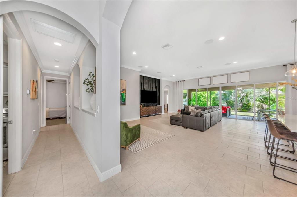 6916 Neopolitan Court Apollo Beach, FL 33572 - Photo 8 of 43 a view of a livingroom with furniture and a garden