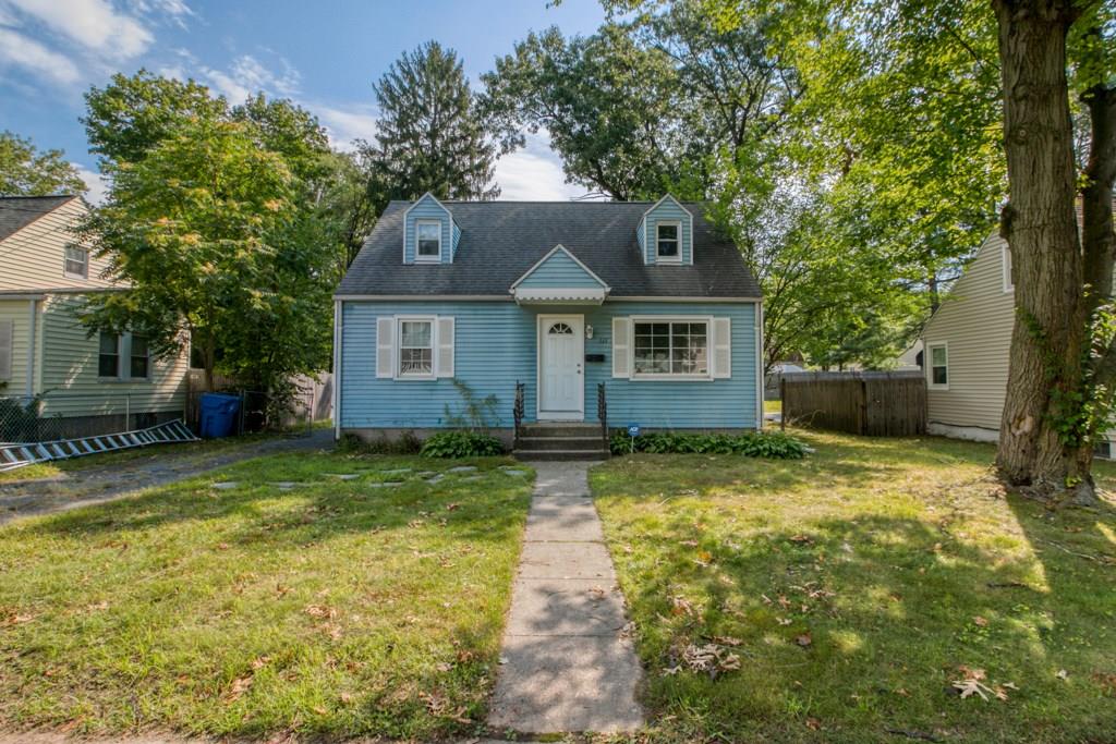 111 Breckwood Boulevard Springfield, MA 01109 - Photo 1 of 25 a front view of a house with a yard