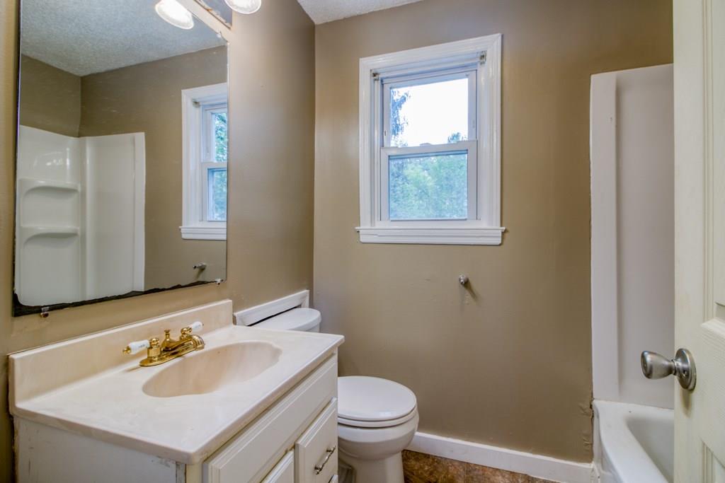 111 Breckwood Boulevard Springfield, MA 01109 - Photo 15 of 25 a bathroom with a sink and a toilet
