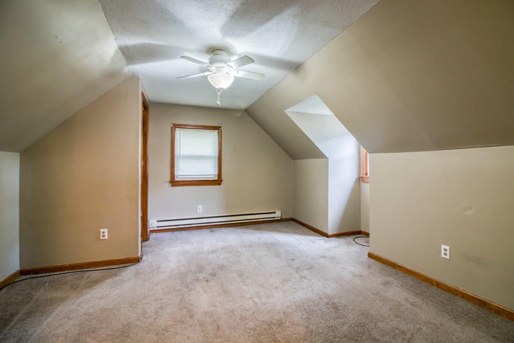 111 Breckwood Boulevard Springfield, MA 01109 - Photo 17 of 25 an empty room with windows and fan