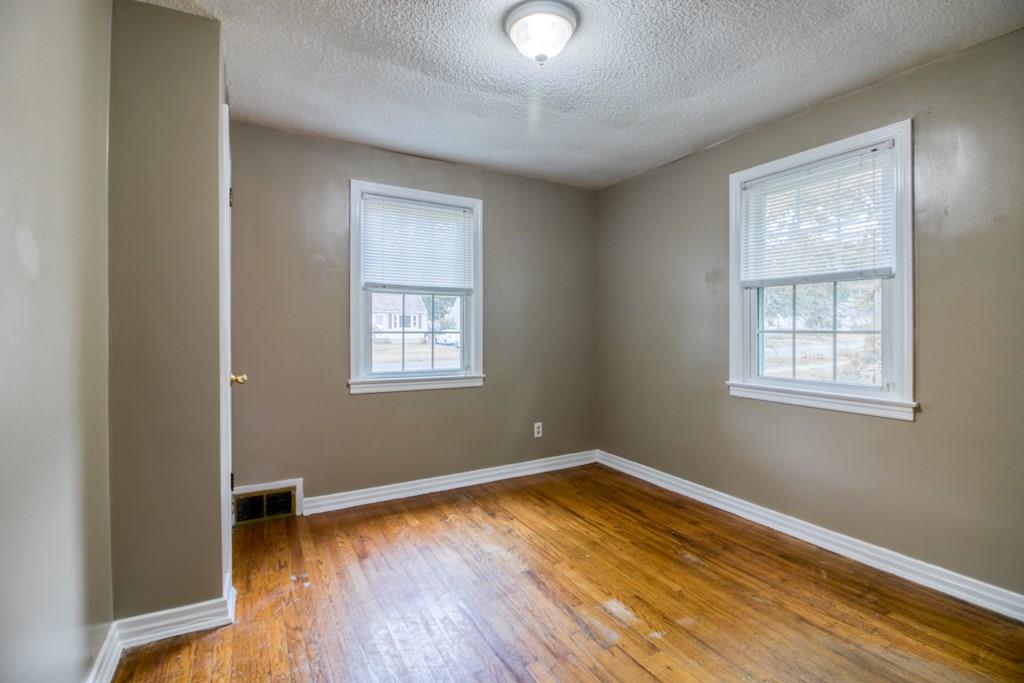 111 Breckwood Boulevard Springfield, MA 01109 - Photo 22 of 25 a view of a room with wooden floor and windows