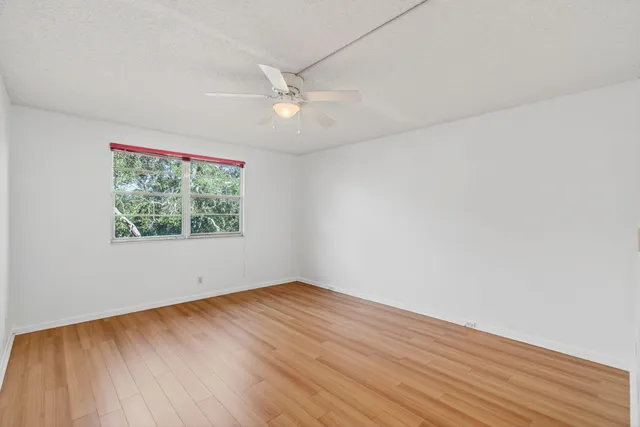 a bathroom with a tub and shower view