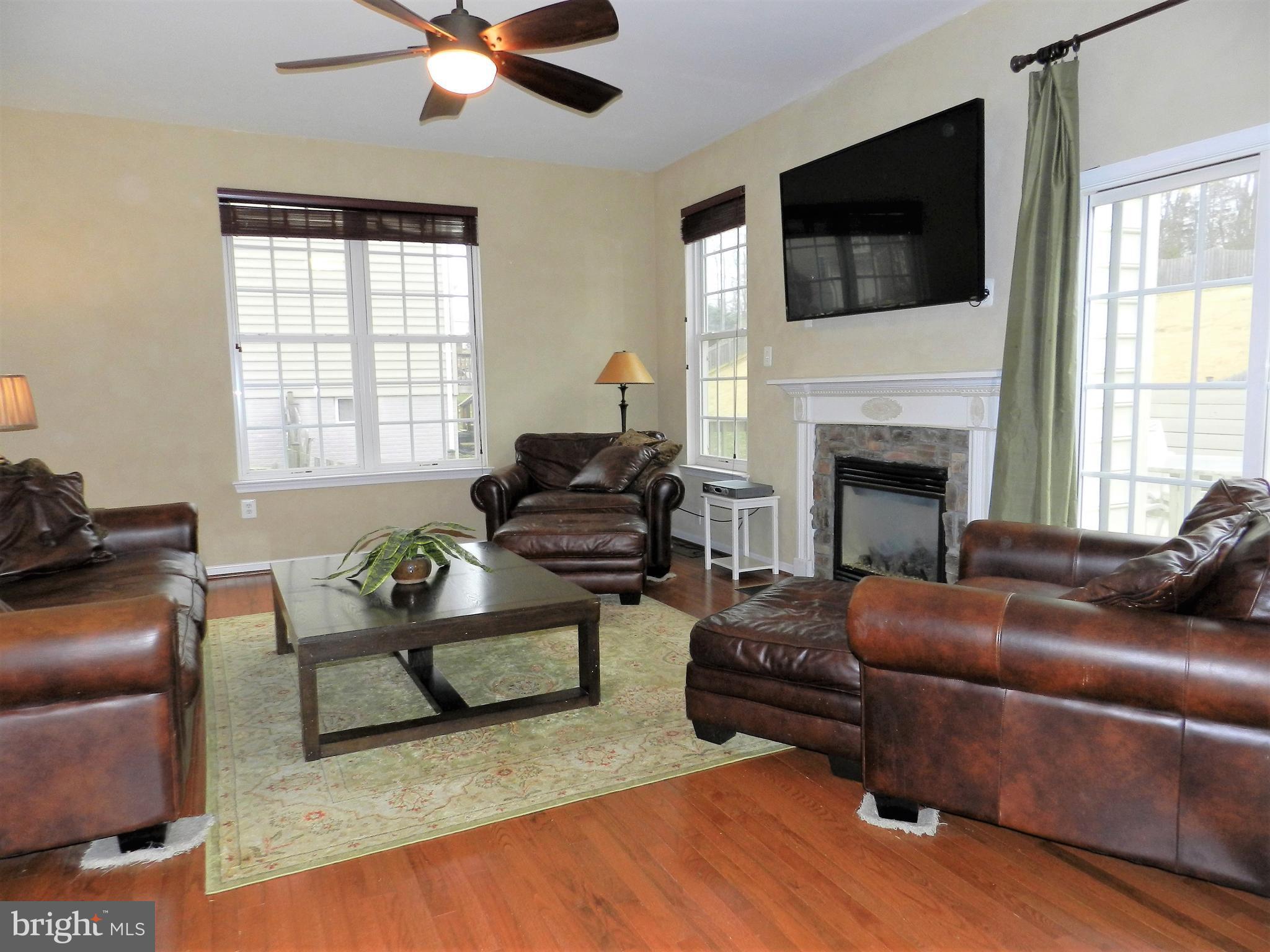 479 Blossom Tree Road Culpeper, VA 22701 - Photo 3 of 30 a living room with furniture fireplace and window