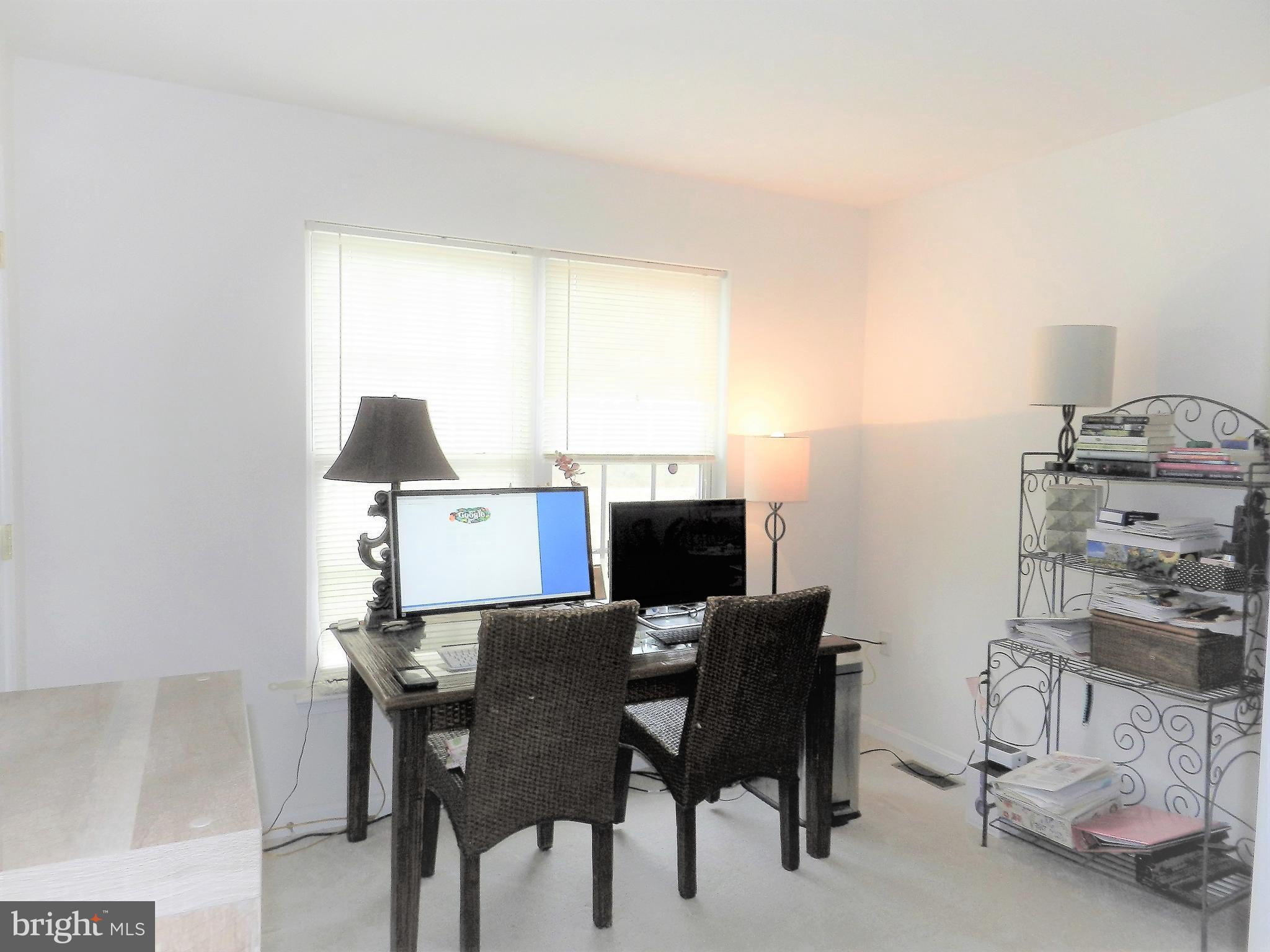 479 Blossom Tree Road Culpeper, VA 22701 - Photo 24 of 30 a view of a workspace with furniture