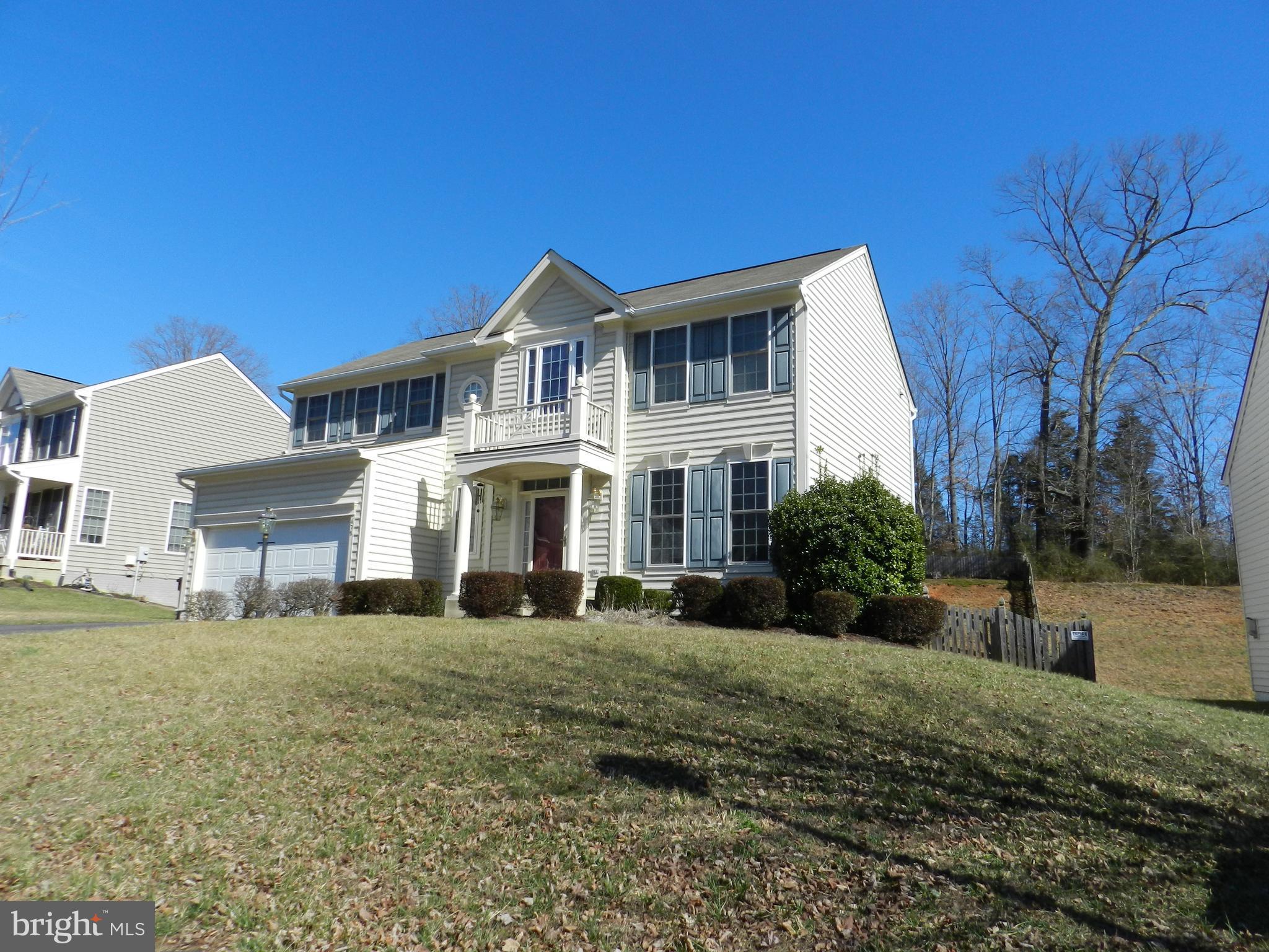 479 Blossom Tree Road Culpeper, VA 22701 - Photo 30 of 30 a front view of a house with a yard