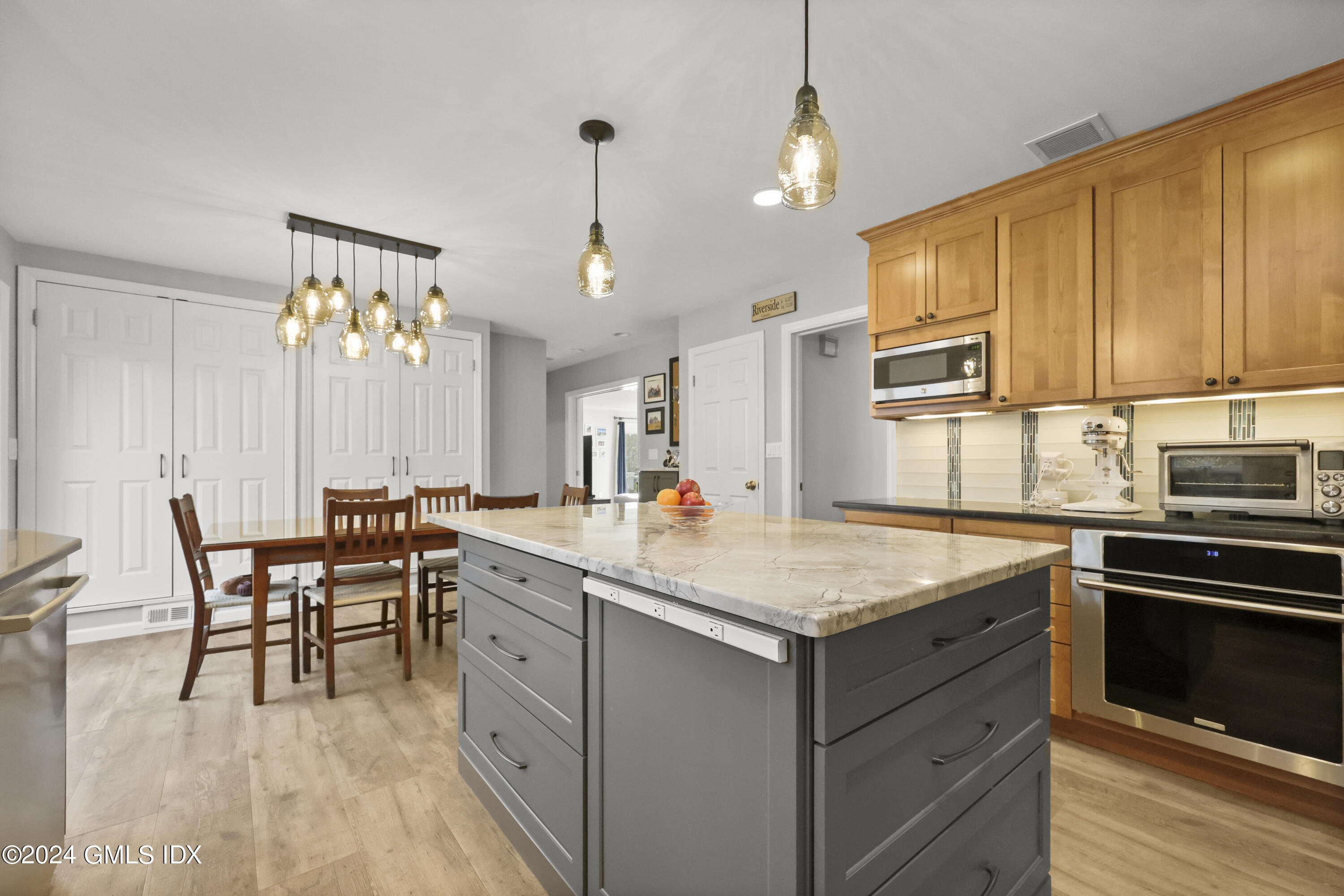 34 Loading Rock Road Riverside, CT 06878 - Photo 6 of 41 a kitchen with a sink and cabinets