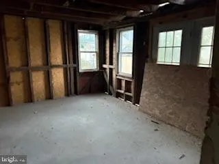 a view of a hallway with stairs