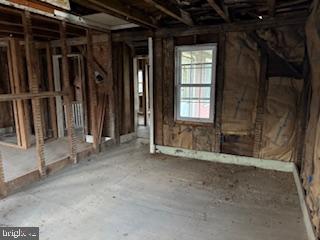 337 Main Street Lykens, PA 17048 - Photo 10 of 23 a view of an empty room with wooden floor and a window