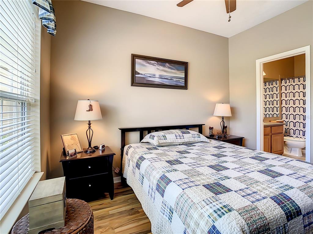 2646 Rutledge Court Winter Haven, FL 33884 - Photo 12 of 23 a bedroom with bed and a window