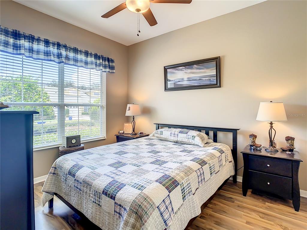 2646 Rutledge Court Winter Haven, FL 33884 - Photo 13 of 23 a bedroom with a bed and a window