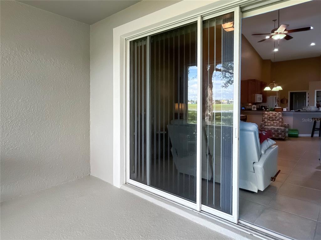 2646 Rutledge Court Winter Haven, FL 33884 - Photo 17 of 23 a view of a glass door and a living room