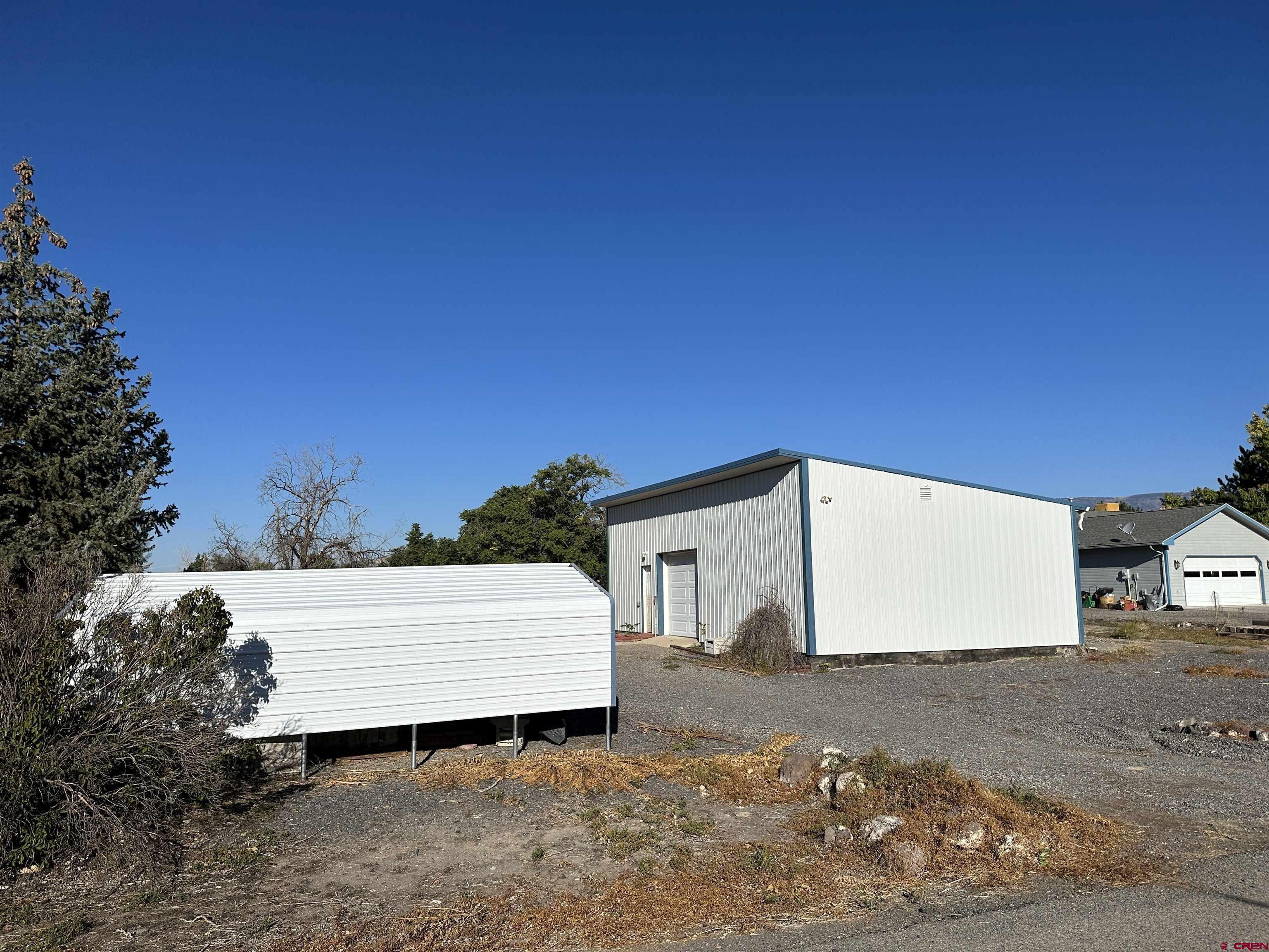20696 Del Ray Drive Eckert, CO 81418 - Photo 1 of 8 a view of backyard with a white fence