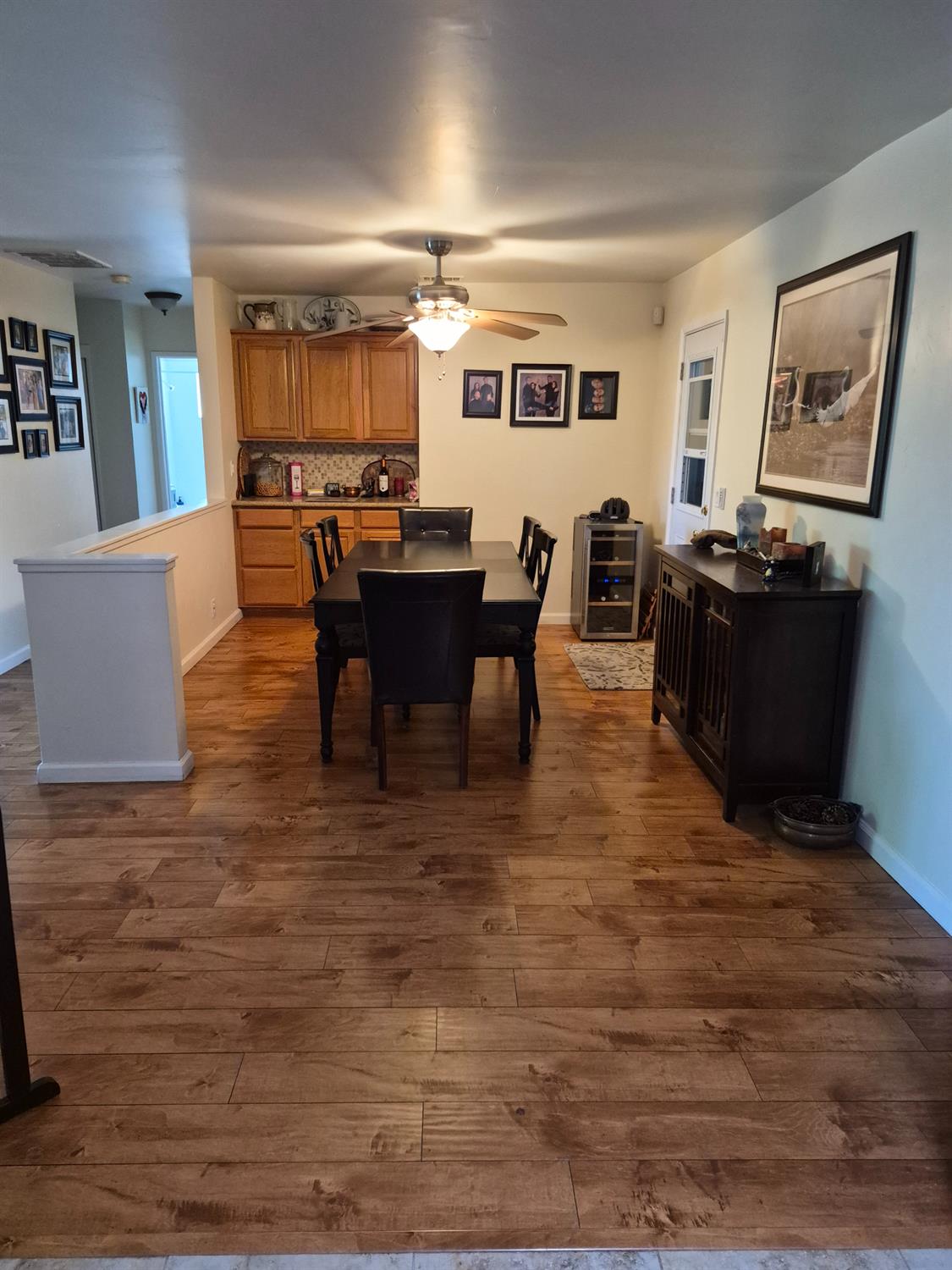 5817 Keyntel Street Citrus Heights, CA 95621 - Photo 4 of 30 a living room with furniture a dining table and wooden floor