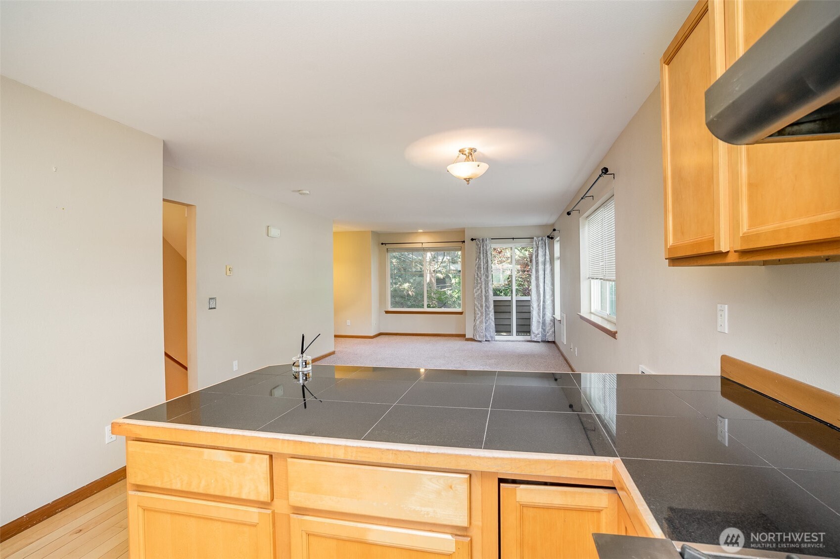 10710 Whitman Avenue North, Unit B Seattle, WA 98133 - Photo 7 of 18 a room with a bed furniture and a window