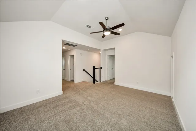 a view of a livingroom with a ceiling fan