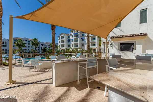 a outdoor space with lots of table and chairs