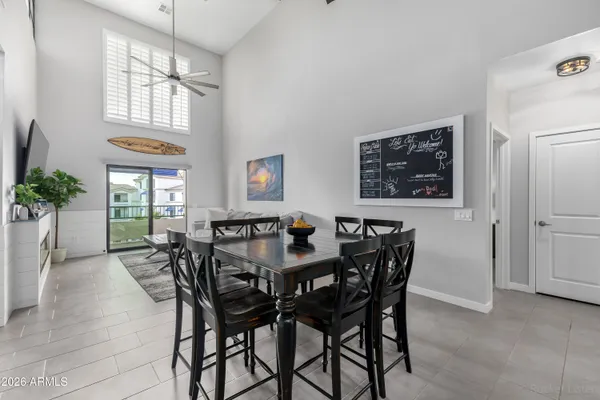 a view of a dining room with furniture and window