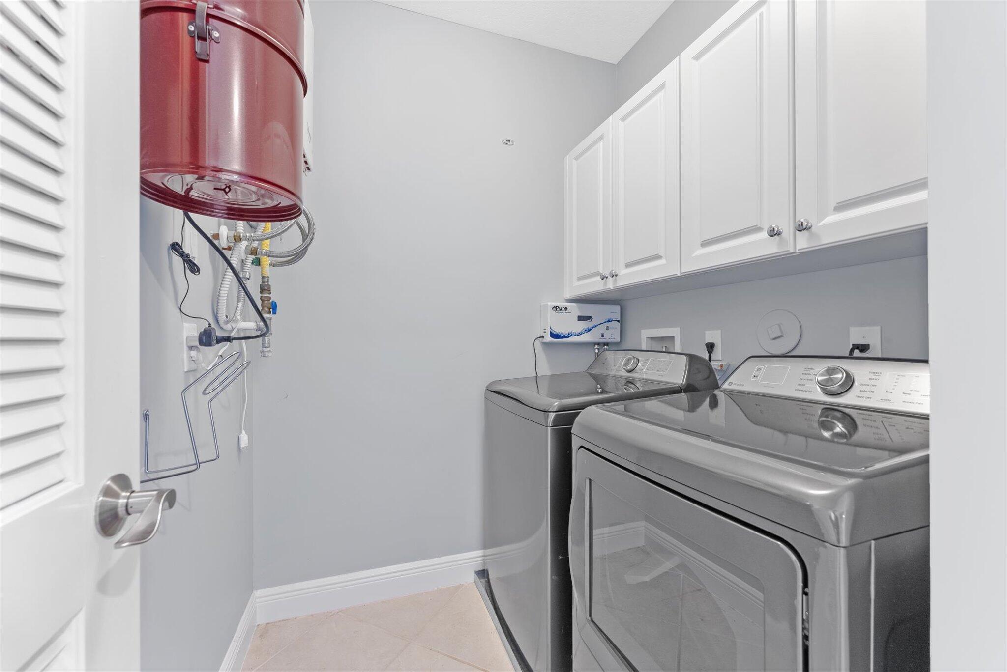 604 Northeast Francesca Lane Boca Raton, FL 33487 - Photo 30 of 58 laundry room on 3rd floor