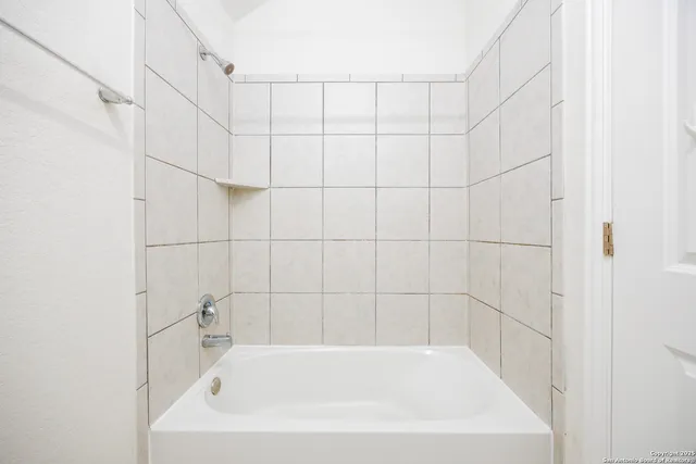 a bathroom with a bathtub