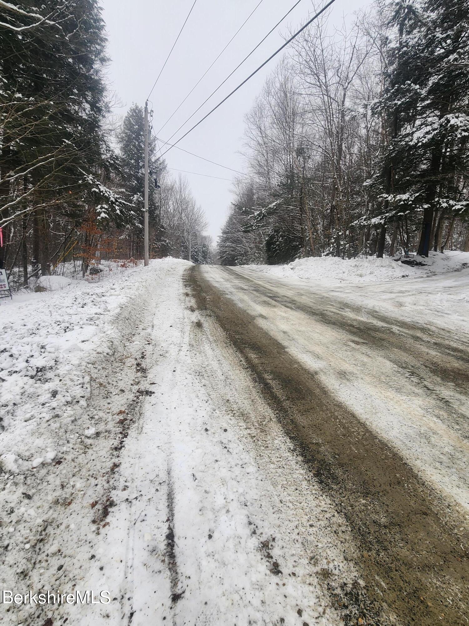 Sparrow Drive Stamford, VT 05352 - Photo 35 of 41 a view of a yard covered in snow