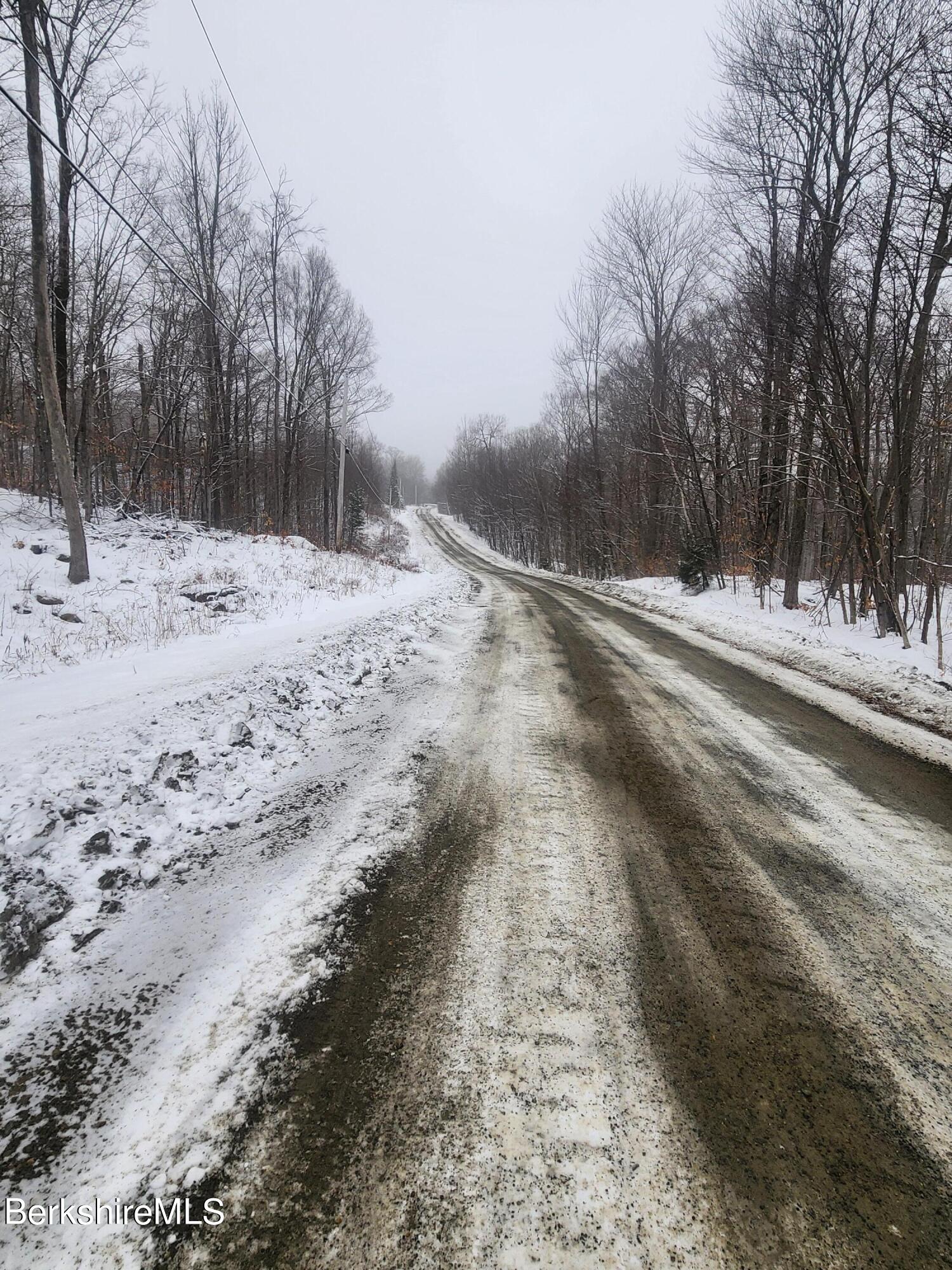 Sparrow Drive Stamford, VT 05352 - Photo 36 of 41 a view of a yard covered in snow