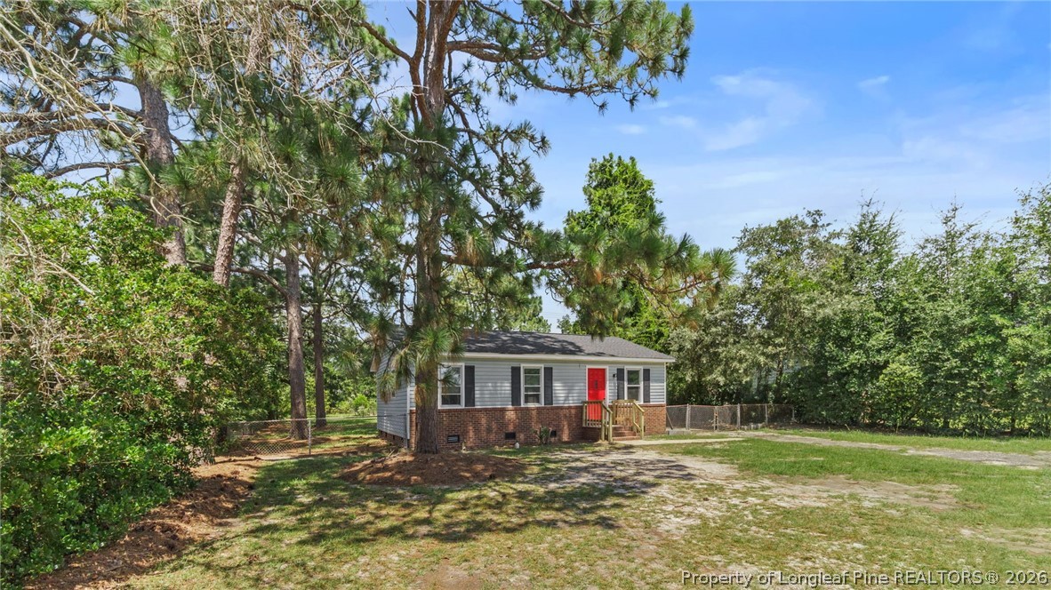 3610 Yorktown Road Hope Mills, NC 28348 - Photo 3 of 30 a view of a house with a yard