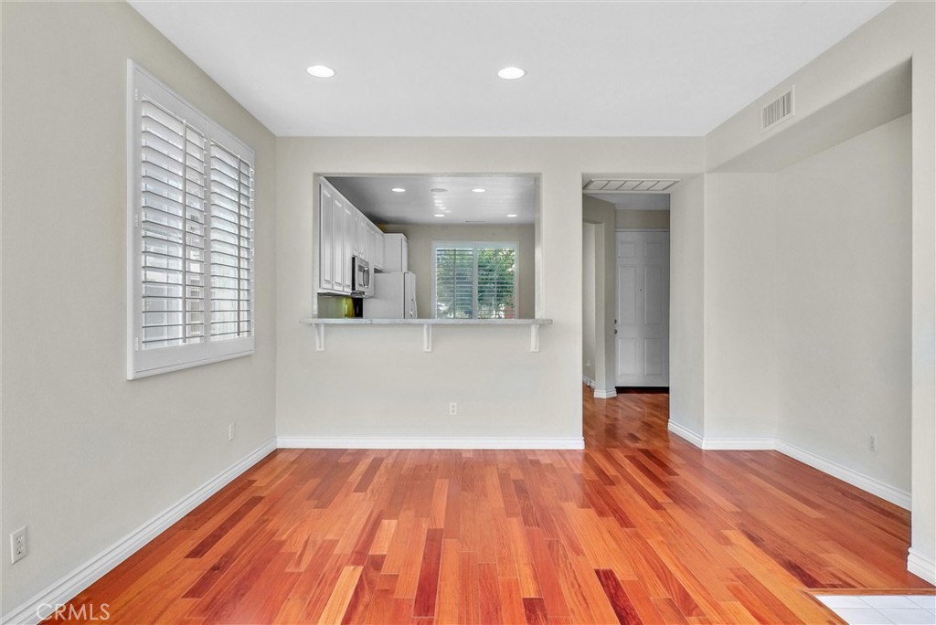 698 Legacy Drive Brea, CA 92821 - Photo 12 of 48 wooden floor in an empty room with a window