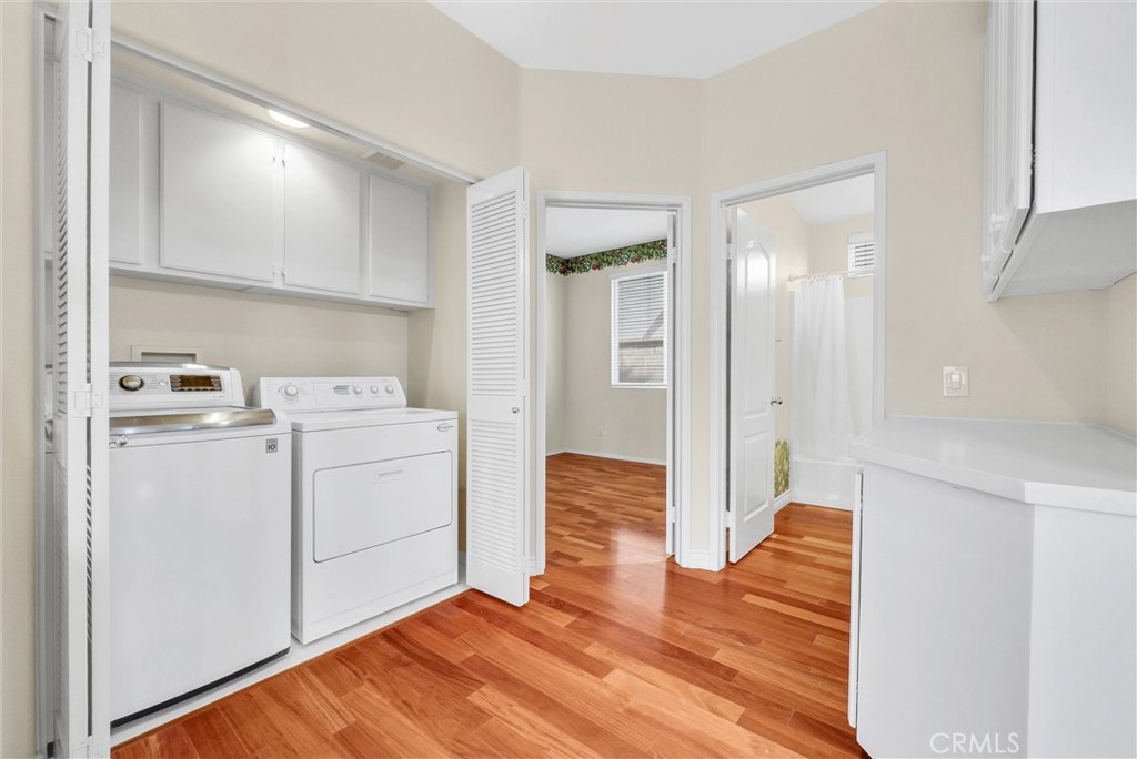 698 Legacy Drive Brea, CA 92821 - Photo 19 of 48 a view of storage and utility room with closet wooden floor and window