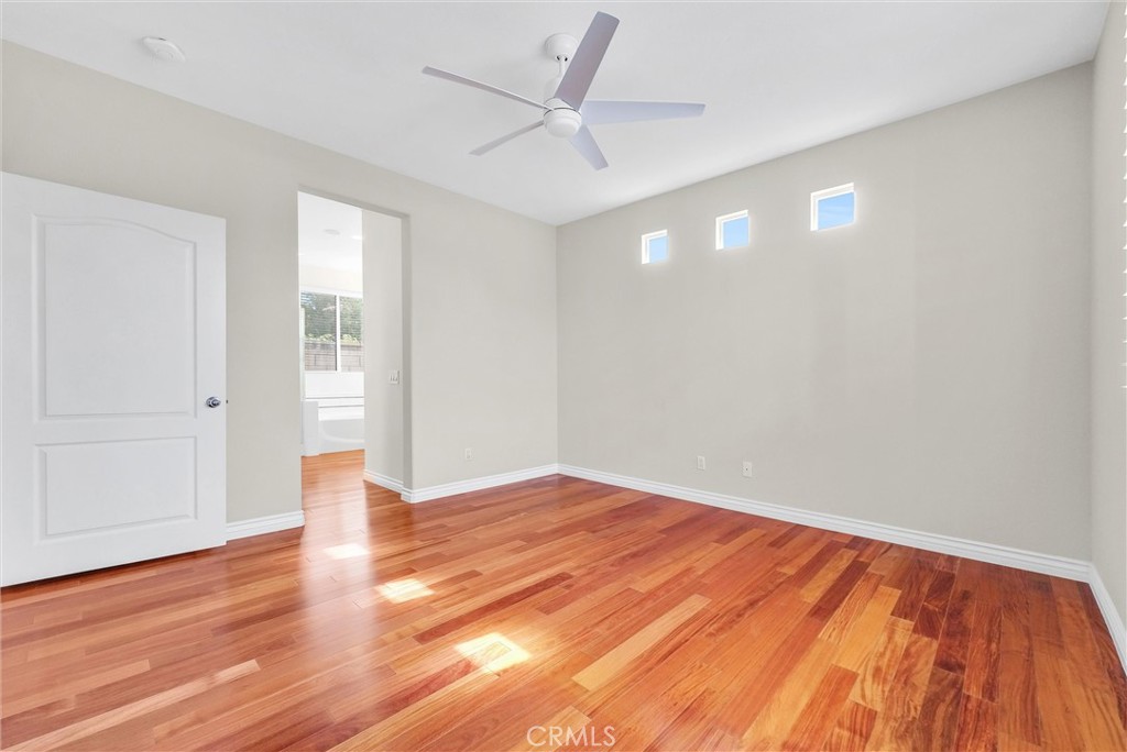 698 Legacy Drive Brea, CA 92821 - Photo 21 of 48 wooden floor in an empty room with a window