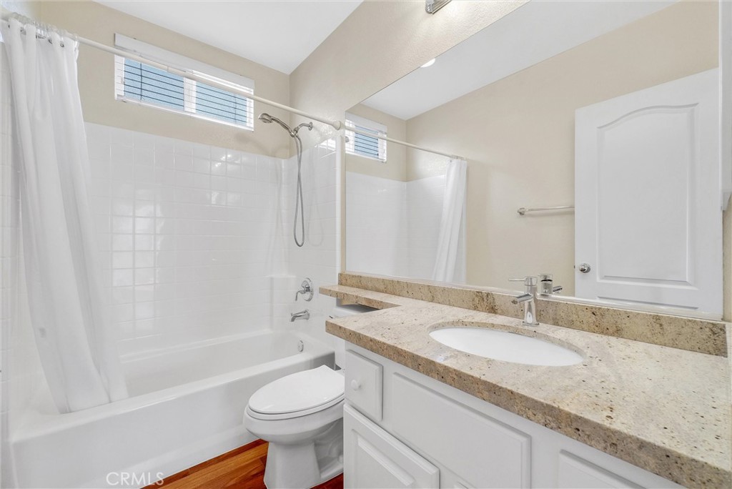 698 Legacy Drive Brea, CA 92821 - Photo 27 of 48 a bathroom with a granite countertop sink toilet and shower