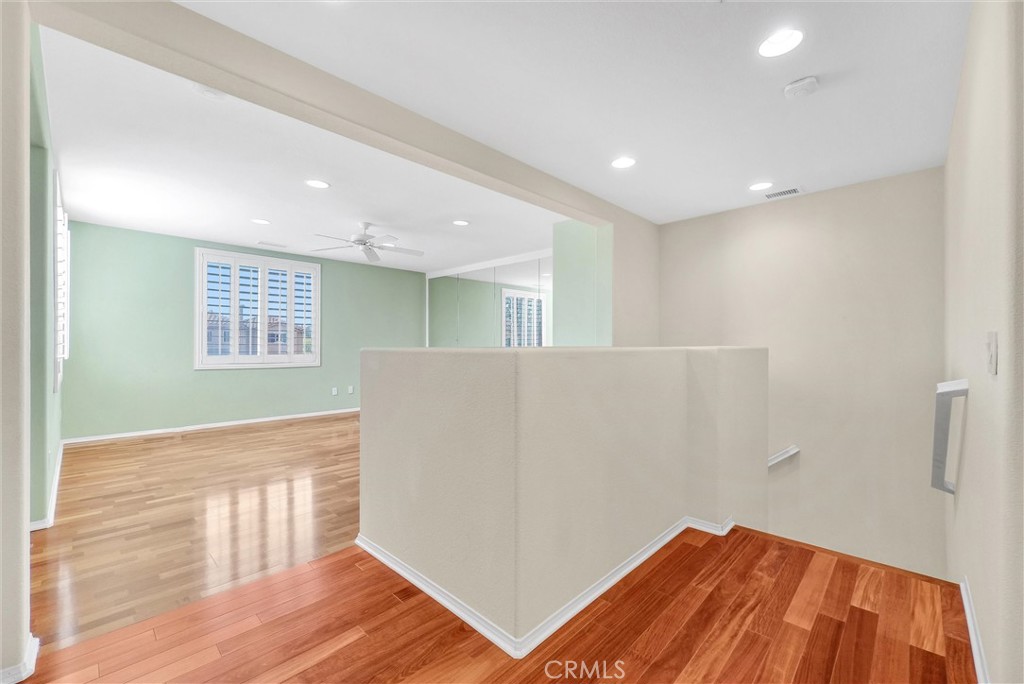698 Legacy Drive Brea, CA 92821 - Photo 31 of 48 a view of an empty room with wooden floor