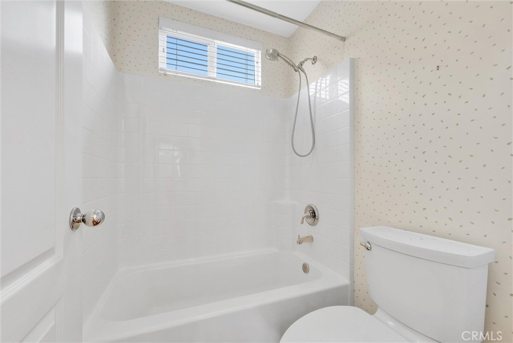 698 Legacy Drive Brea, CA 92821 - Photo 38 of 48 a bathroom with a shower and a toilet