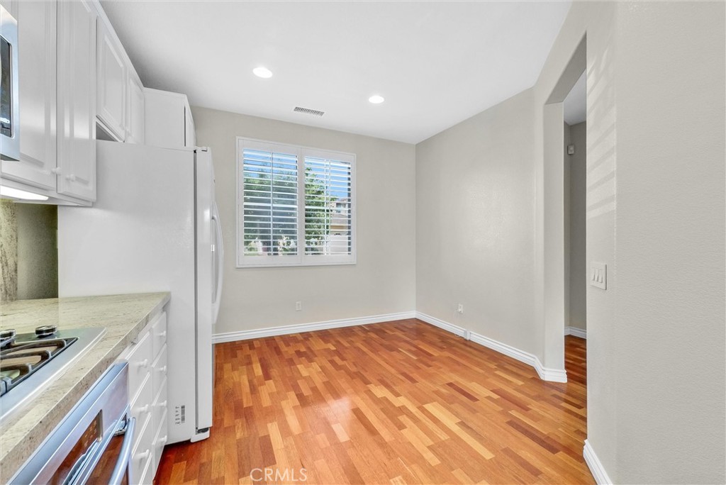 698 Legacy Drive Brea, CA 92821 - Photo 6 of 48 a view of kitchen with granite countertop cabinets appliances and a sink