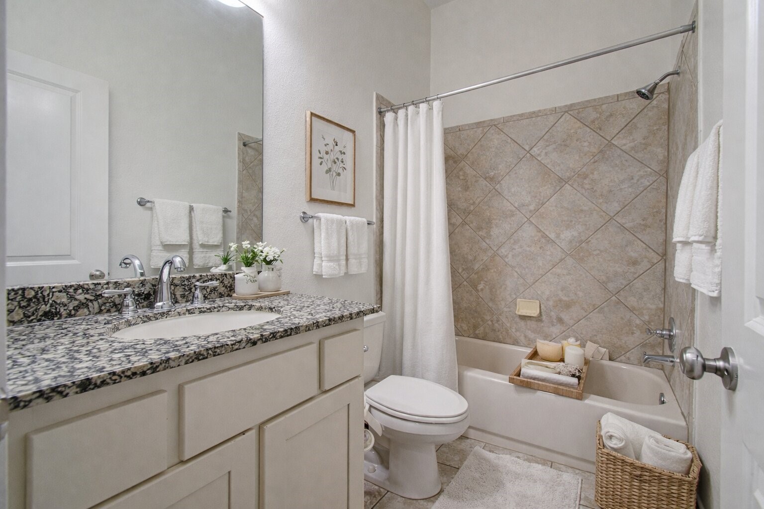 6614 Rising Hills Lane Sugar Land, TX 77479 - Photo 20 of 28 a bathroom with a granite countertop sink and a mirror