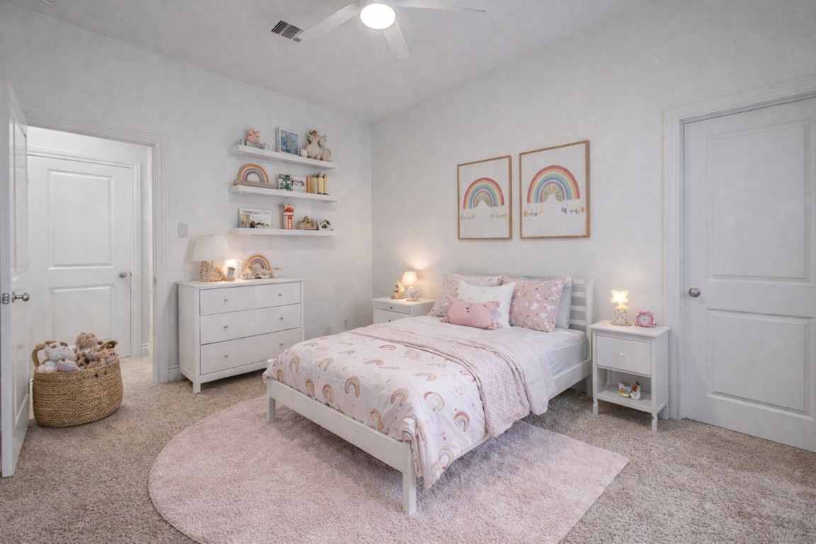6614 Rising Hills Lane Sugar Land, TX 77479 - Photo 21 of 28 a bedroom with a bed and a cabinets